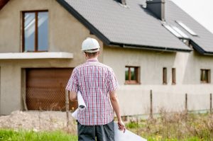 insulation contractor in front of house